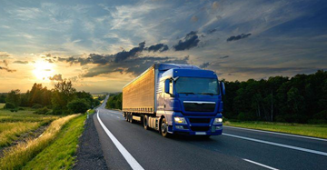 Road transport in Europe with cargo trucks and delivery vans on highway logistics operations
